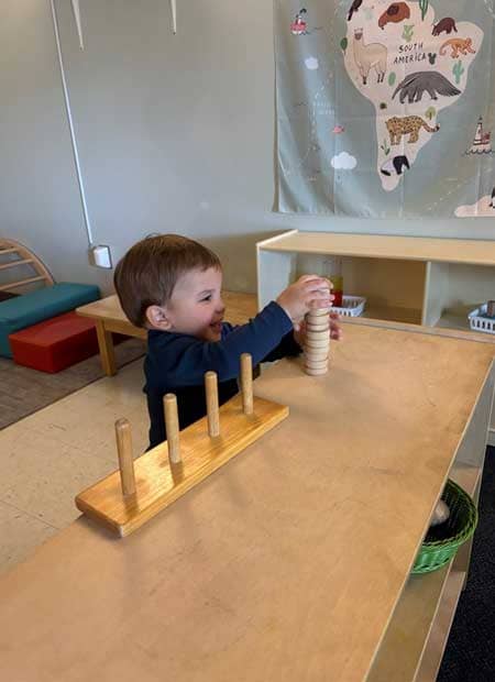 Student working on Montessori materials
